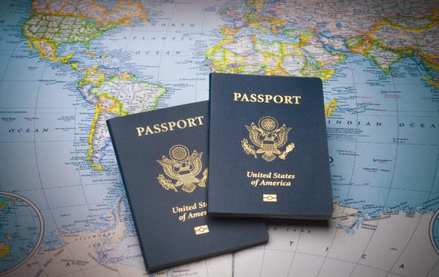 Passports on a map of the world